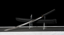 Obsidian Kensei Tactical Sword (Limited) — high-carbon steel, Black ribbed grip, small gold ring, black textured sheath,
