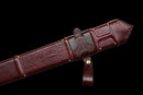 Templar Medieval Longsword — Manganese, Brown leather grip, steel, green gem, brown leather scabbard, tooled.