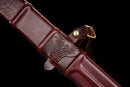 Templar Medieval Longsword — Manganese, Brown leather grip, steel, green gem, brown leather scabbard, tooled.