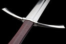 Templar Medieval Longsword — Manganese, Brown leather grip, steel, green gem, brown leather scabbard, tooled.