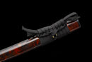 Guren Katana 紅蓮 — San-Mai Red Roast folded steel blade, copper dragon fittings, crimson marbled lacquer saya, black ito handle.