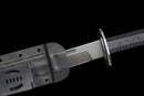 Iron Reaper Tactical Dao — high-carbon steel, Black textured handle, black ribbed polymer sheath with clip.