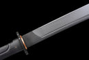 Champion Chopper Tactical Sword — Ceramic Edition — Black ergonomic grip, orange ring, black tactical, carbon fiber pattern