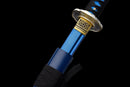 Close-up of Aoi Ryū Katana showing a blue blade partially drawn from a matching saya, with a black handle and intricate golden tsuba. Aoi...