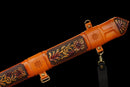 Aurantia Longsword — Spring Steel, Orange leather grip, silver steel guard/pommel, tooled orange leather scabbard.