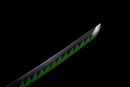 Close-up of a katana blade with a green zigzag design against black background, sharp and reflective finish. Sanemi Shinazugawa Katana.