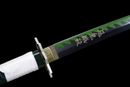 Close-up of katana blade with green accents and intricate black patterns, featuring a white-wrapped handle. Sanemi Shinazugawa Katana.