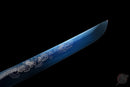 Close-up of a blue tanto blade with intricate white dragon engravings on a black background, Ryūjin Tanto Ryujin.